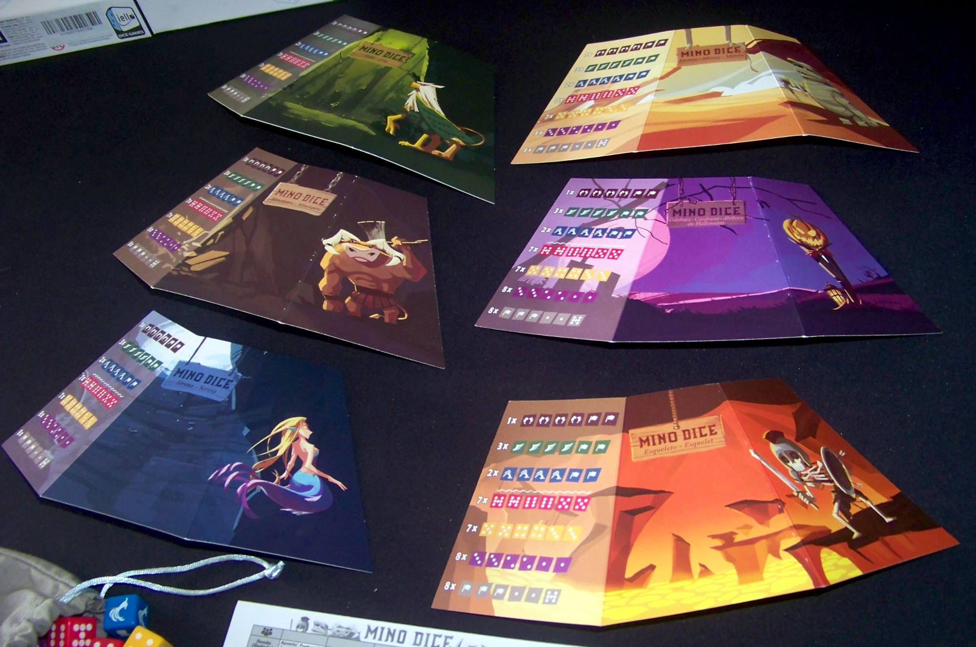 Juego de mesa Mino Dice - exterior de las pantallitas